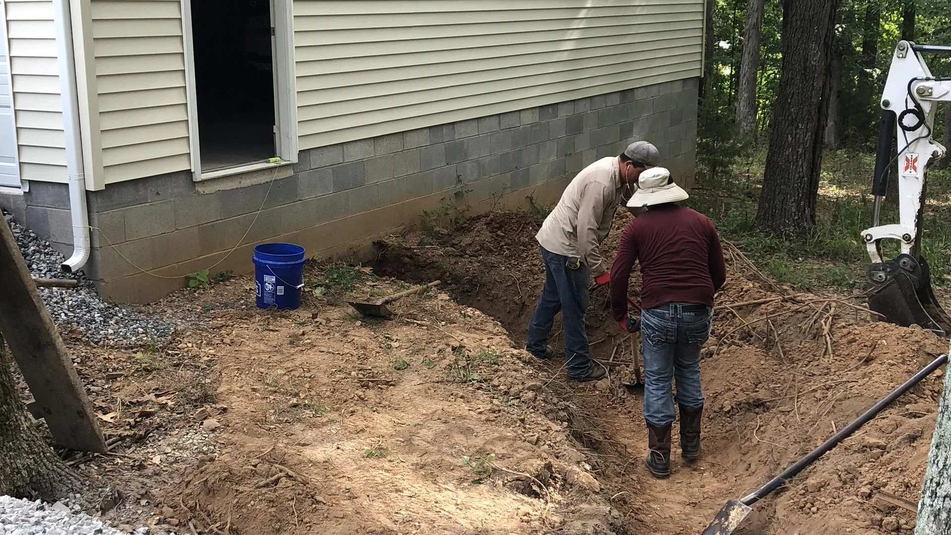 Our employees working hard at a job site in Benton.