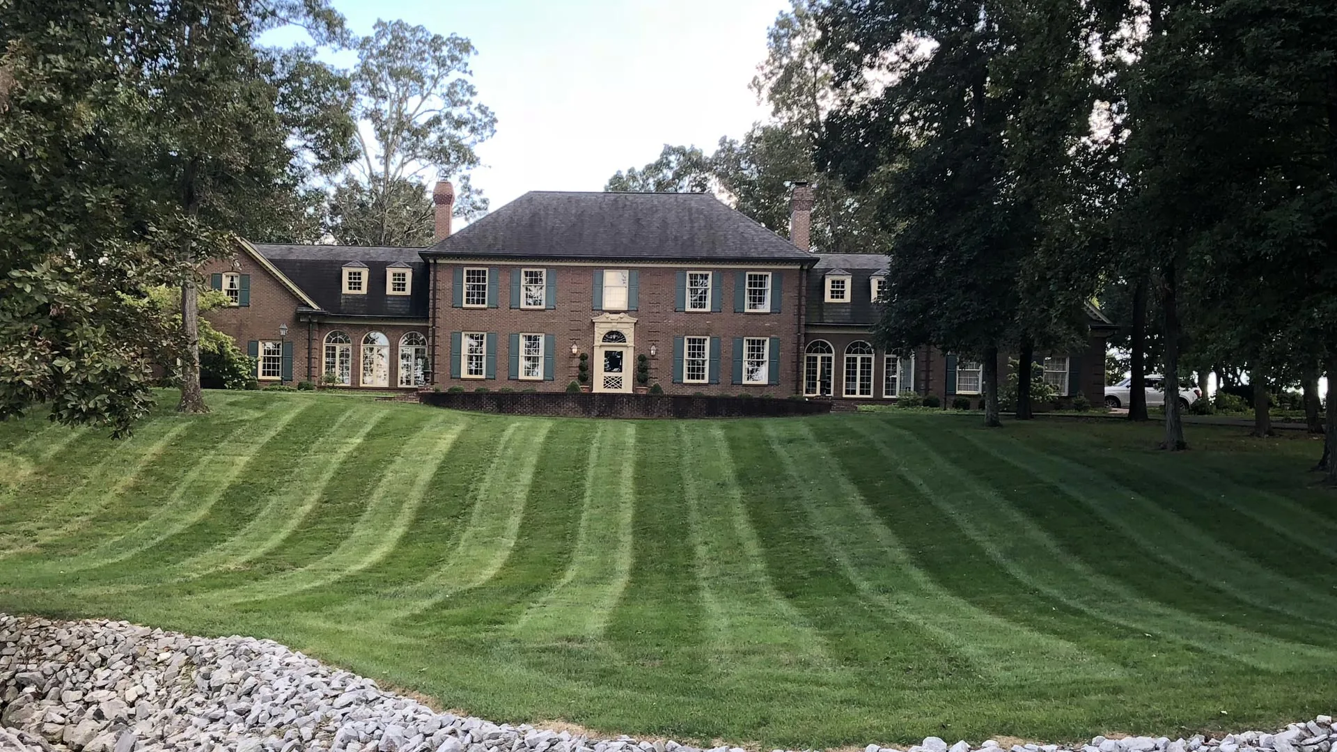 Large front lawn at a private residential property in Murray, KY.