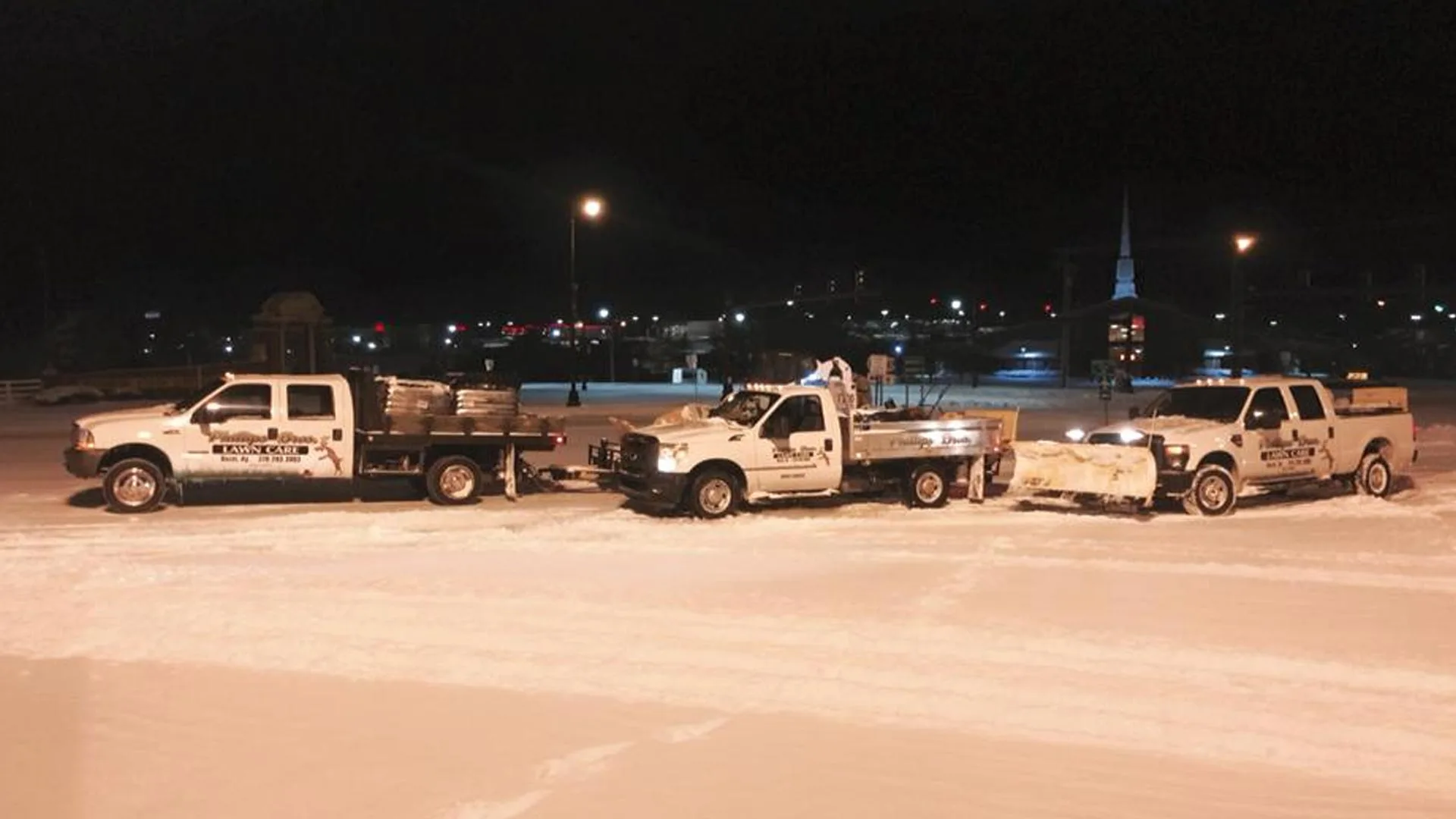 We use our snow plows to clear the parking lots of our clients.