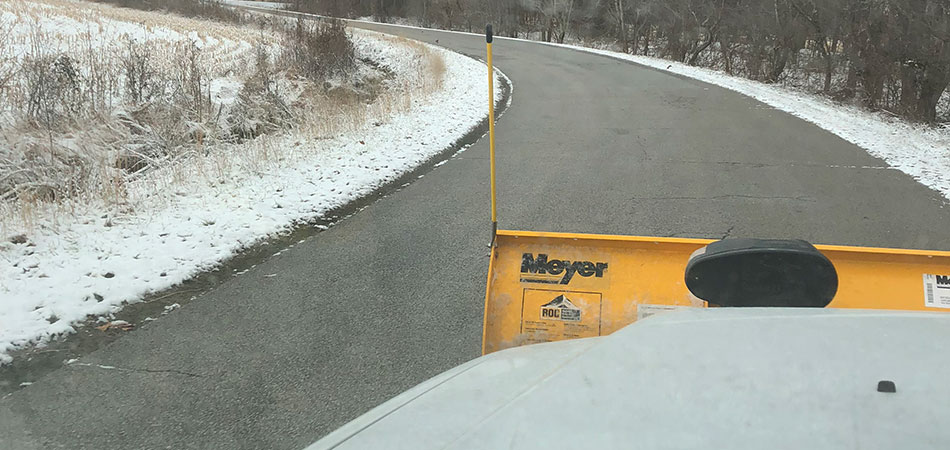 Our team member is in route to a commercial client in Murray to clear their parking lot of snow.